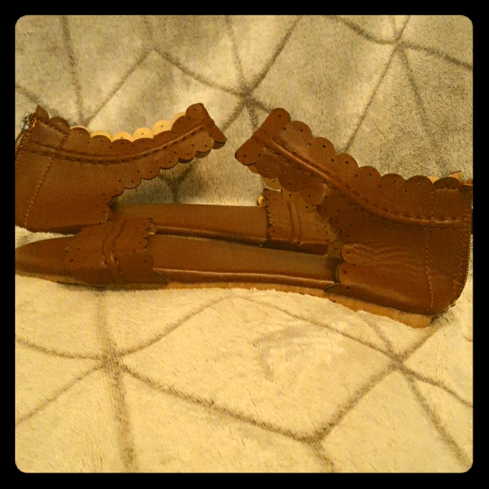 Flat brown sandals